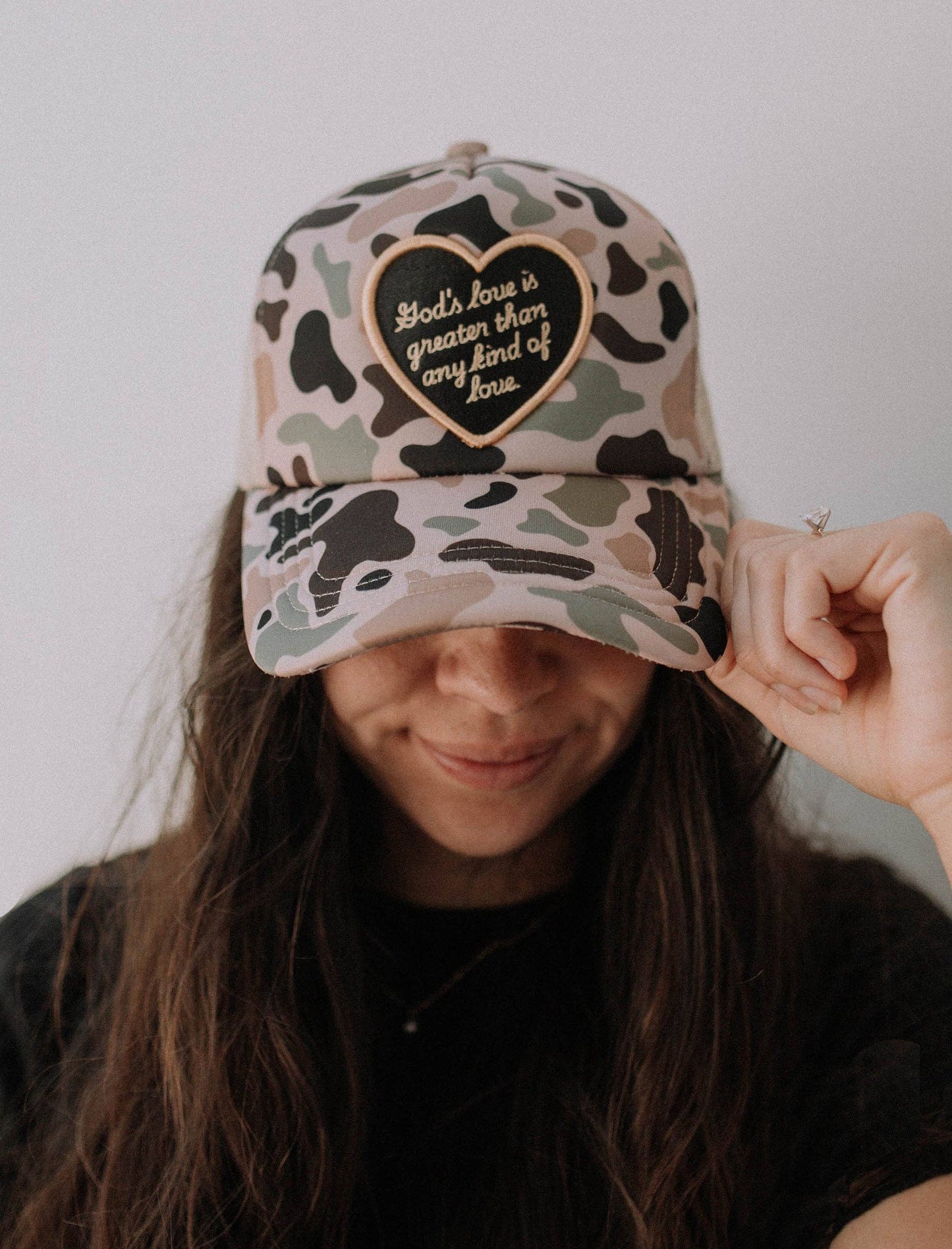 Hat: God's love is greater